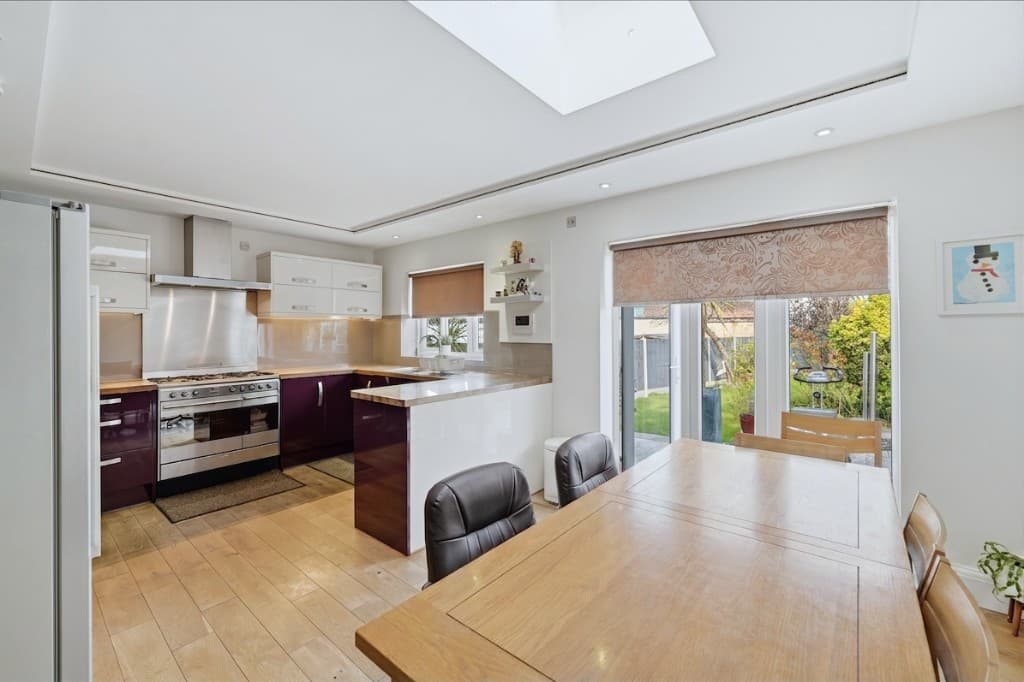 The same kitchen diner with the table and worktops cleared